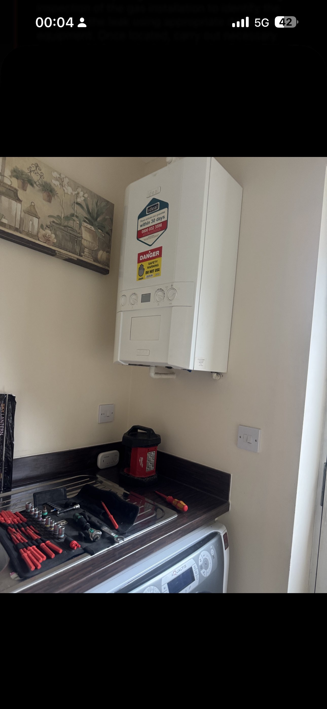 Completed boiler installation with cover refitted