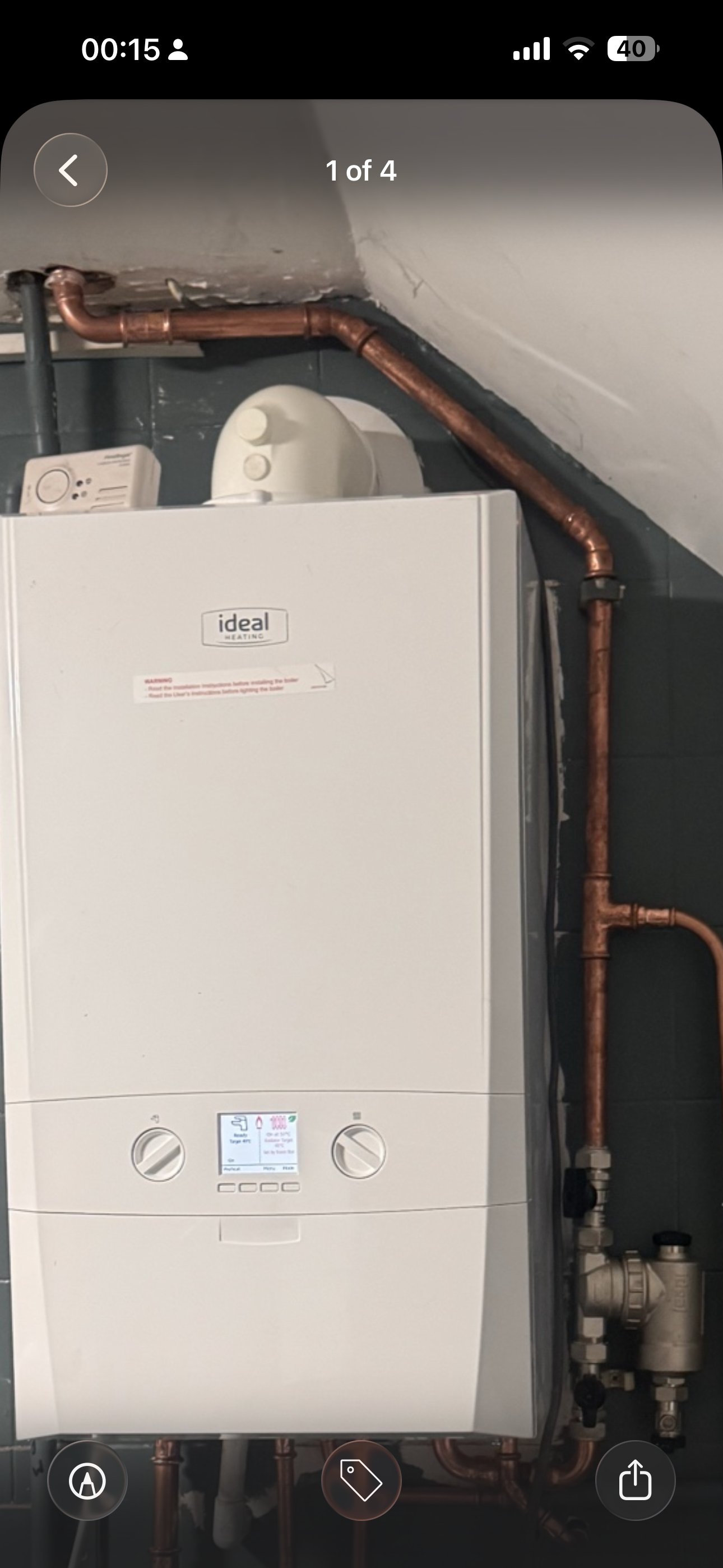 Boiler installation showing new gas valve and controls